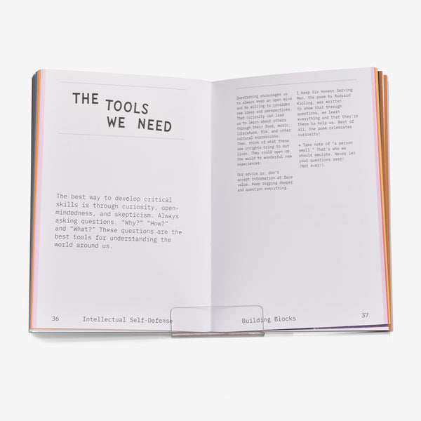 Open book to a page titled The Tools We Need with text on a white background