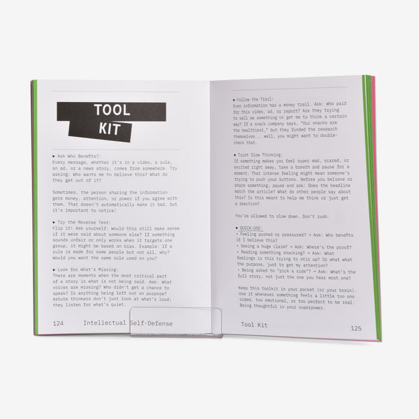 Open book showing pages with text and a 'Tool Kit' a quick guide for critical thinking section.