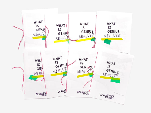 Multiple zines with 'What is genius, really?' text on a white background