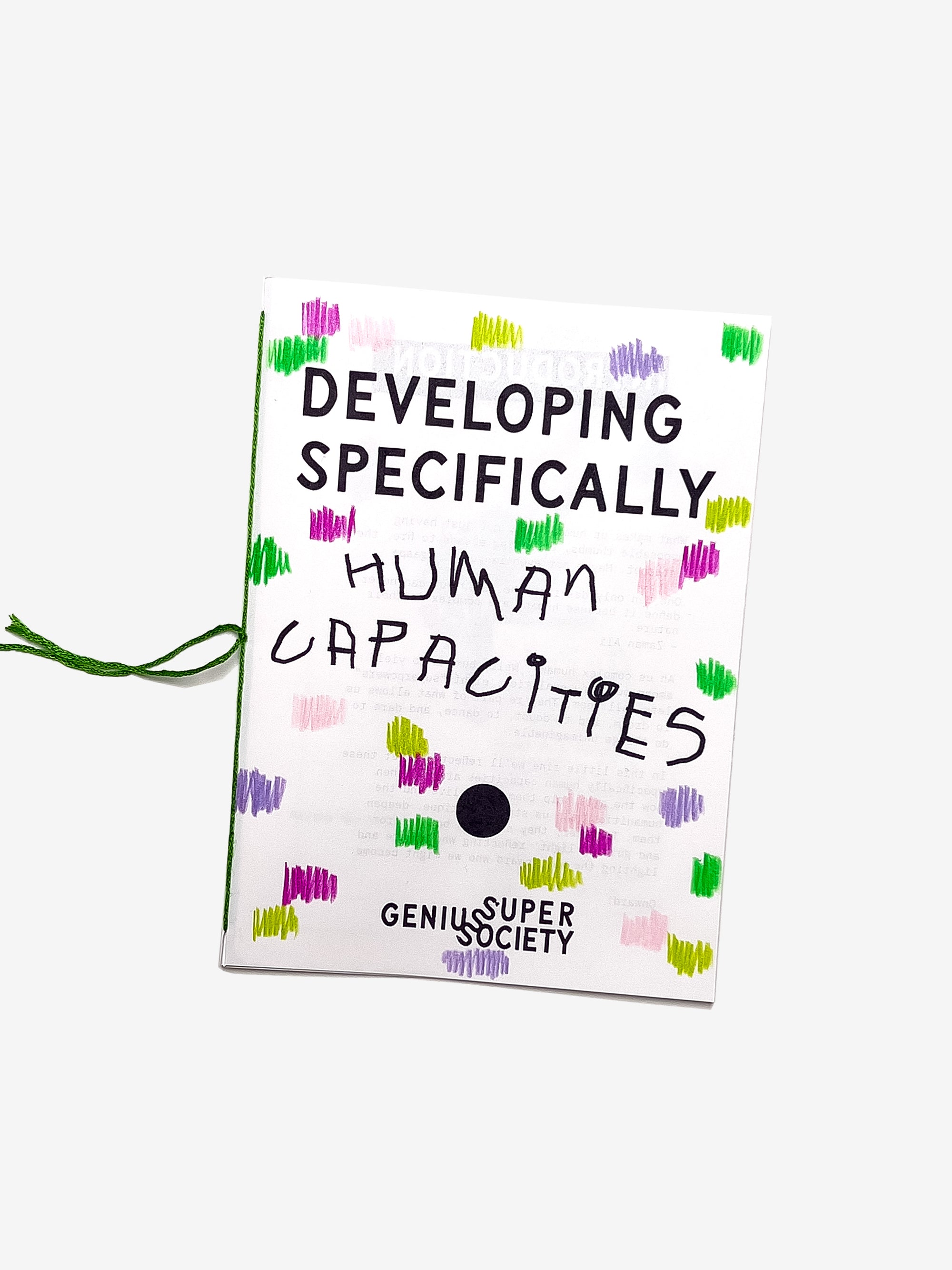 Book titled 'Developing Specifically Human Capacities' by Super Genius Society on a white background
